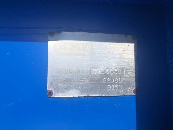 Empacadora horizontal de doble pistón KMF usada